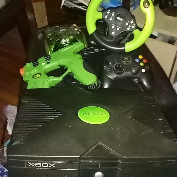 I'm showing my original Xbox console and controllers, gun,and steering wheel - Picture 4 of 4